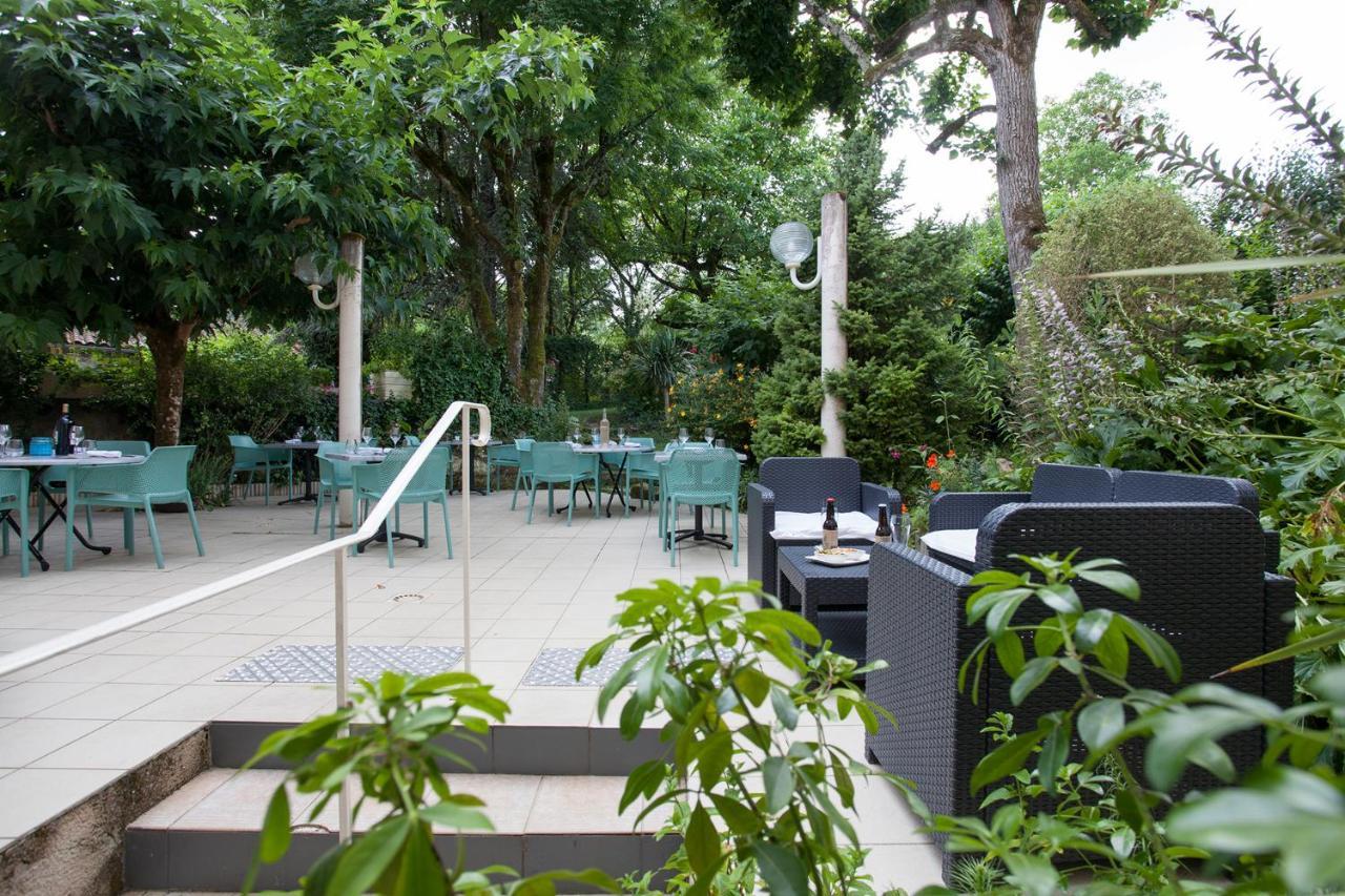 Le Lion D'Or Hotel Manzac-sur-Vern ภายนอก รูปภาพ