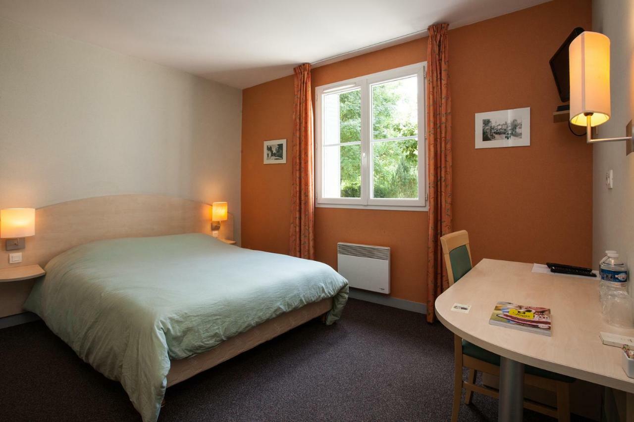 Le Lion D'Or Hotel Manzac-sur-Vern ภายนอก รูปภาพ