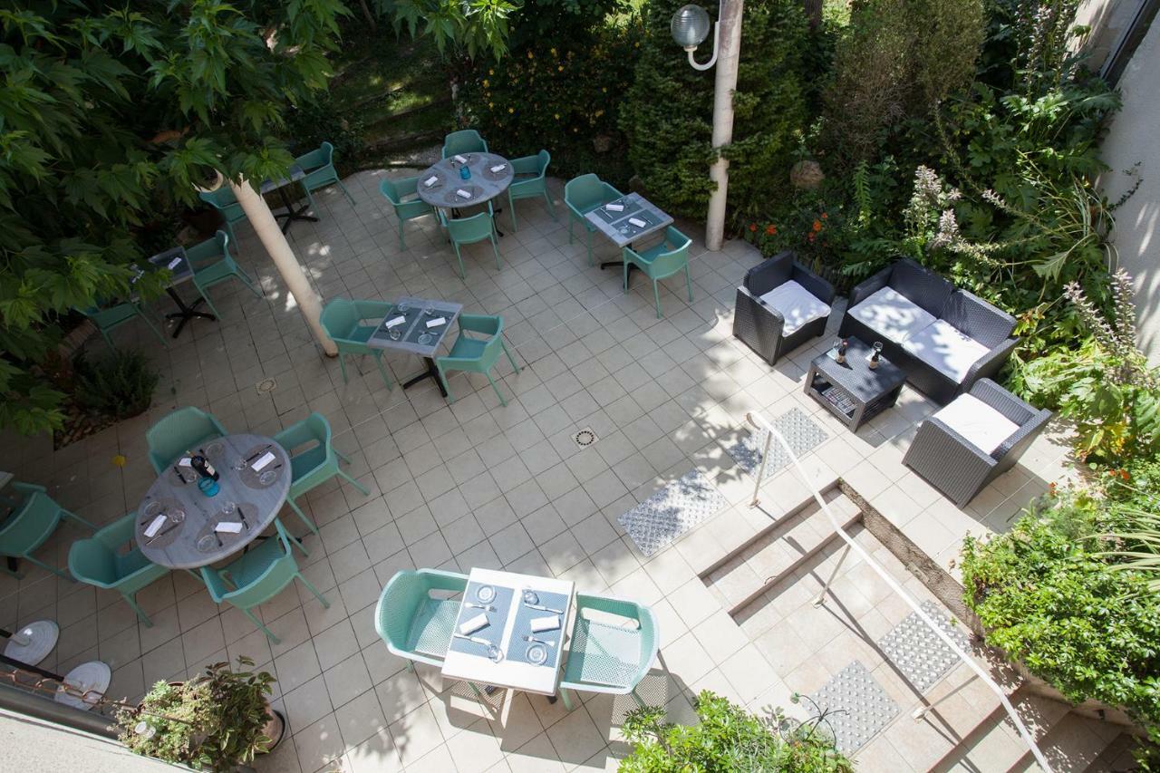 Le Lion D'Or Hotel Manzac-sur-Vern ภายนอก รูปภาพ